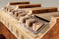 a close up of a wooden model of a building