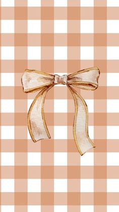 an image of a bow on a checkered tablecloth background that looks like it could be used as a greeting card