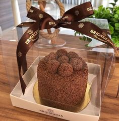 a chocolate cake in a box on a table