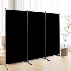 a room divider in front of a black screen