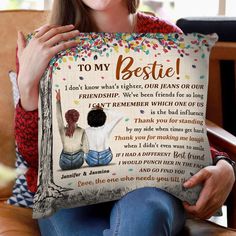 a woman sitting on a chair holding a pillow with the words to my bestie