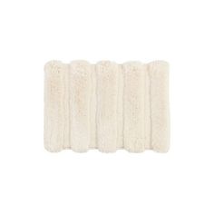 four pieces of white sheepskin on a white background