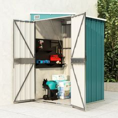 an outdoor storage shed with shelves and tools in the door open to show items inside