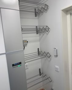 a white refrigerator freezer sitting inside of a kitchen