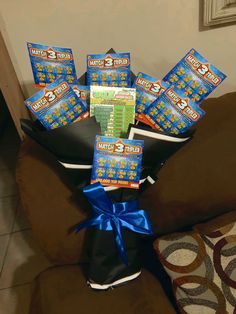 a bouquet of snacks sitting on top of a couch