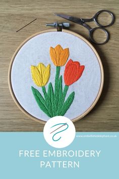 an embroidery pattern with flowers on it and the words free embroidery pattern in front of it