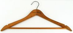 a wooden coat hanger on a white background