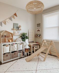 a child's room with toys, bookshelves and shelves