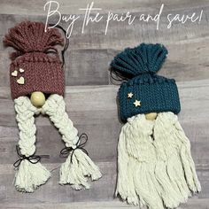 two knitted hats with tassels and bells on them, one has a pom - pom