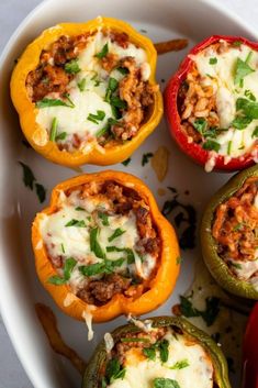 stuffed peppers with meat and cheese on a plate