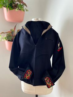 1950's Naval Sailor Wool Popover Jacket with original liberty cuffs This top was my grandfather's original navy uniform pullover. He was a third-class boatmen's mate and served from 1952-1955. He spent time oversees in Hawaii, Philippines, Guam, Formosa (now Taiwan), Hong Kong and Japan. He Served on the USS Onslow which was a sea plane tender. * Features -Front Pocket -White piping on collar and cuffs -Cuffs have two original buttons on each side  -Original Liberty cuffs from Hermosa China (now Navy Uniform, Sea Plane, Navy Uniforms, Cracker Jack, Cracker Jacks, 1950s Vintage, Front Pocket, Taiwan, Embroidery Patterns