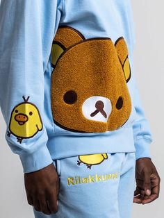 Long sleeve, ribbed crew neck sweatshirt Embroidered logo on the front Embroidered chenille patch with satin stitching Embroidered Kiiroitori on the sleeve 100% cotton Imported Officially licensed Rilakkuma merchandise The male model is wearing a large sweatshirt.The female model is wearing a small sweatshirt. Chenille Patch, Rilakkuma, Satin Stitch, Female Model, Male Model, Apparel Accessories, Crew Neck Sweatshirt, Stitching, Sleeve Length