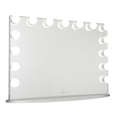 a white lighted mirror with multiple lights on it