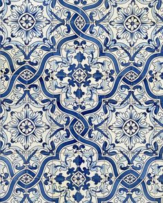 an intricate blue and white tile pattern