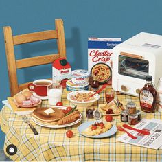 a table topped with lots of food next to a toaster oven