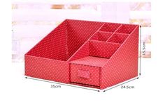 a red and white polka doted desk organizer with four compartments on each side,