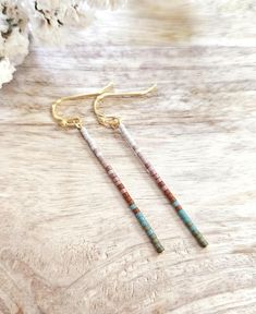 Matte olive, turquoise, rust, copper, light mauve, and pearl seed bead earrings. Choice of gold or silver finish. Lead/Nickel free hooks with rubber backs. 2 ¹/⁴ inches long. I'm slowly transitioning our smaller beaded earrings and adding new styles to our sister shop https://bohohobojewelryco.etsy.com  A few of our original beaded styles will stay here. Return to shop 👇 https://wyldsparrowjewelry.etsy.com PLEASE MAKE SURE YOUR ADDRESS IS ENTERED CORRECTLY. IF YOU ARE DOING A GUEST CHECKOUT PLE Western Beaded Earrings, Gold Beaded Earrings, Copper Light, Dramatic Earrings, Earrings Western, Gold Bead Earrings, Minimalist Earrings Gold, Bee Creative, Light Mauve