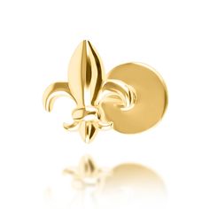 a gold fleur de lis earring on a white background