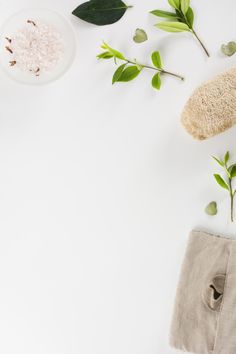 some plants and other items on a white surface