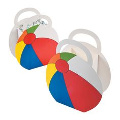 two colorful beach balls sitting on top of each other