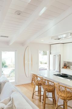 the kitchen is clean and ready to be used as a living room or dining area