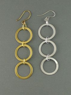 Gold Plated Vermeil & Sterling Silver Three Circle Dangle Earring Supply Available in Gold Plated Vermeil or Sterling Silver Circle: 18mm x 0.5mm Total Length: 2 2/3 inches Sold in pairs Add french wire earrings to make a three circle dangle earrings! French Wire Earrings, Easy Jewelry, Earrings Everyday, Modernist Jewelry, Unusual Jewelry, Long Dangle Earrings, French Wire, Brass Jewelry, Wire Earrings