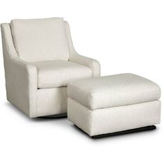 a white chair and ottoman sitting next to each other