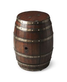 a wooden barrel with metal rivets on the top and bottom is shown in front of a white background