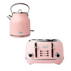 a pink toaster and kettle sitting next to each other