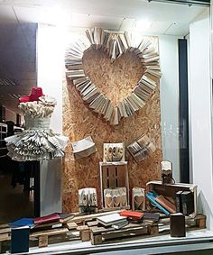 a window display with books and other items