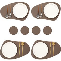 a set of four place settings with forks and spoons