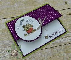 a close up of a card with a flower pot on the front and words blessing