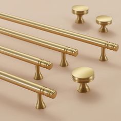 an assortment of brass handles and knobs