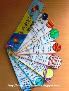 the bookmarks have different designs on them and are decorated with words that spell out space