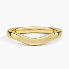 a yellow gold wedding band with curved edges