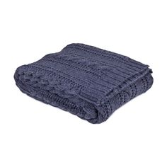 a blue knitted blanket on a white background