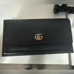 Pre Owned It's In Excellent Condition, No Scratches Bought It On Fashionpille Brand New Authentic Gucci Designer Wallet For Formal Occasions, Elegant Gucci Wallet For Formal Occasions, Classic Gucci Wallet For Evening, Luxury Gucci Wallet For Evening, Elegant Gucci Bifold Bag, Designer Gucci Evening Wallets, Gucci Bifold Evening Wallet, Gucci Black Wallet For Formal Occasion, Black Gucci Wallet For Evening