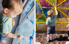 two young boys are painting on the wall and one boy is playing with his hands