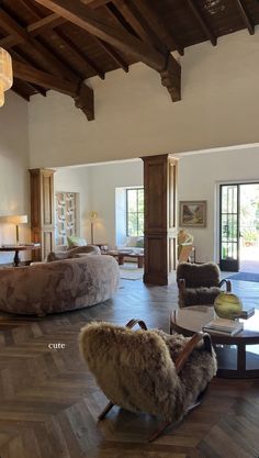 a living room filled with lots of furniture