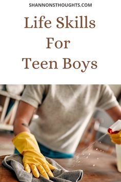 a person in yellow gloves and rubber gloves cleaning a wooden table with text overlay that reads life skills for teen boys