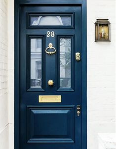 a blue door with the number 28 on it