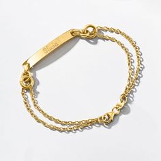 Ross-Simons - Name - Italian 14kt Yellow Gold ID Bracelet. 7". A little simplicity for your stack! From Italy, this 14kt yellow gold ID bracelet features a glossy bar centered on two chic cable chains. FREE engraving of a name with up to 10 characters in your choice of block or script type. Lobster clasp, 14kt yellow gold personalized ID bracelet. Classic 14k Gold Personalized Chain Bracelet, Classic Personalized 14k Gold Chain Bracelet, 14k Gold Nameplate Bracelet For Everyday, 14k Gold Tarnish Resistant Nameplate Bracelet, Classic Yellow Gold Sterling Silver Bracelets, Gold Nameplate Chain Bracelet For Everyday Wear, Everyday Gold Nameplate Chain Bracelet, Everyday 14k Gold Nameplate Bracelet, Minimalist 14k Gold Nameplate Bracelet