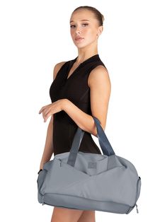 This amazing utility duffle has it all- roomy fully lined inside compartment in addition to a separate side entry pocket for shoes or wet items. Additional exterior pockets make organizing your dance gear a breeze. DANZNMOTION All In One Dance Duffle Bag Grey B24512 Tropical Dance, One Dance, Dance Gear, Dance Movement, Relaxing Yoga, Discount Dance, Dance Bag, Dance Fashion, Dance Workout