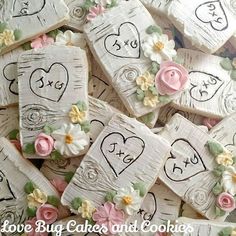 decorated cookies with hearts and flowers on them