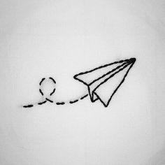 a drawing of a paper airplane flying in the sky with a string attached to it