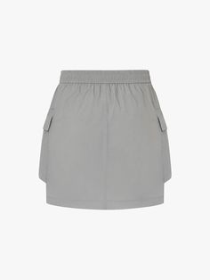 MO&Co. Women's Drawstring Detail Pocket Skirt Introducing our skirt - a must-have for any fashion-forward individual. Crafted from luxurious, comfortable fabric, this mini cargo silhouette features an elasticated waist with a drawstring for the perfect fit. The large patch pocket design adds functionality, making it a versatile piece for casual occasions. Pair with our coordinating cropped Jacket for a sophisticated, elevated look. Features : - Inclusive mini cargo silhouette- Elasticated waist with drawstring- Side large patch pocket design Code: MBD2SKT008The back length of size S is 38cmMATERIALS & CARE Material: 100% PolyamidePlease put it into a mesh bag to wash.REMINDER: All items are measured manually. Please note that it's reasonable that there might be minor measurement difference Spring Casual Nylon Mini Skirt, Casual Mini Cargo Skirt With Elastic Waistband, Casual Nylon Mini Skirt, Casual Mini Skort With Drawstring, Utility Mini Skort With Side Pockets, Casual Mini-length Skort With Drawstring, Casual Nylon Mini Skirt For Summer, Spring Mini Cargo Skirt With Elastic Waistband, Utility Summer Skirt With Cargo Pockets