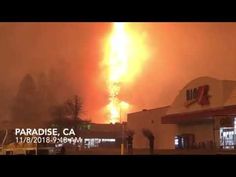 a fire is seen in the sky above a building