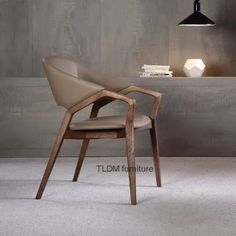 the modern chair is made from wood and leather