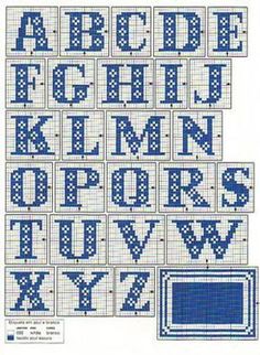 cross stitch alphabets with letters and numbers in blue, black and white colors on a white background