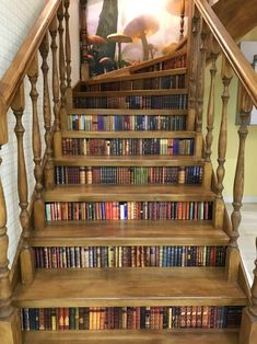 an old wooden staircase with books on it